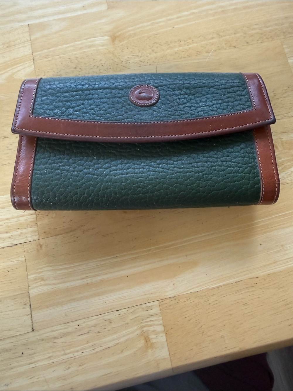 Dooney & Bourke Green Pebbled Leather Fold-Over Wallet with Brown Trim